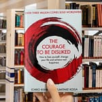 Cover of "The Courage to Be Disliked" by Ichiro Kishimi and Fumitake Koga, with bold minimalist typography on a plain background.